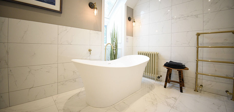 Our self catering accommodation suites contain luxury bathrooms with a bath and shower at our Portree accommodation Somerled House Suites