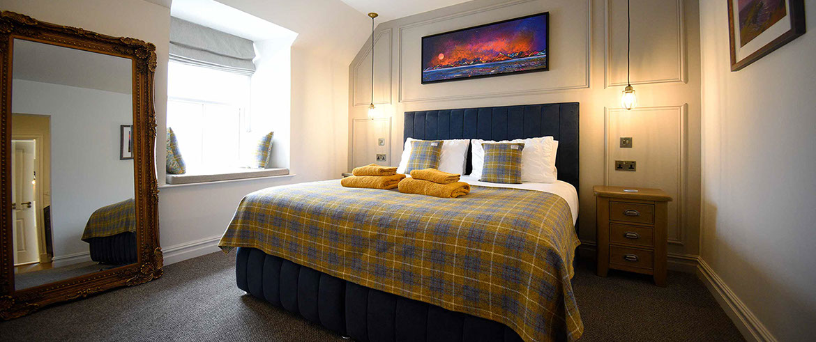 Somerled House Suites room 5 contains a King size bed with all bedding and linen provided at our Portree accommodation
