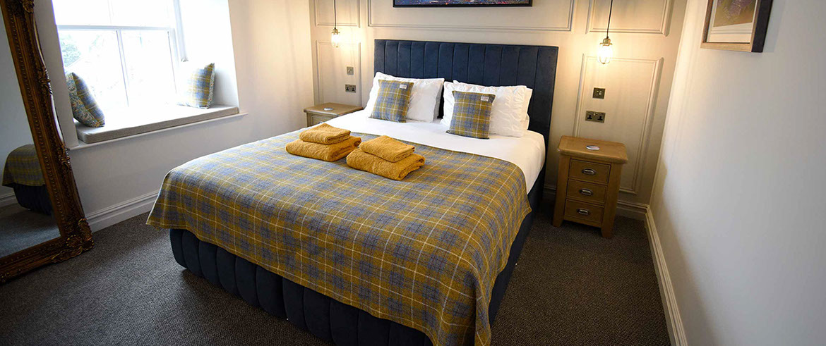 Somerled House Suites contains a king size double bed with all bedding and linen provided at our Portree accommodation