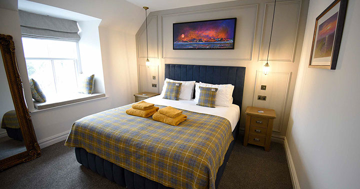 Somerled House Suites contains a king size double bed with all bedding and linen provided at our Portree accommodation