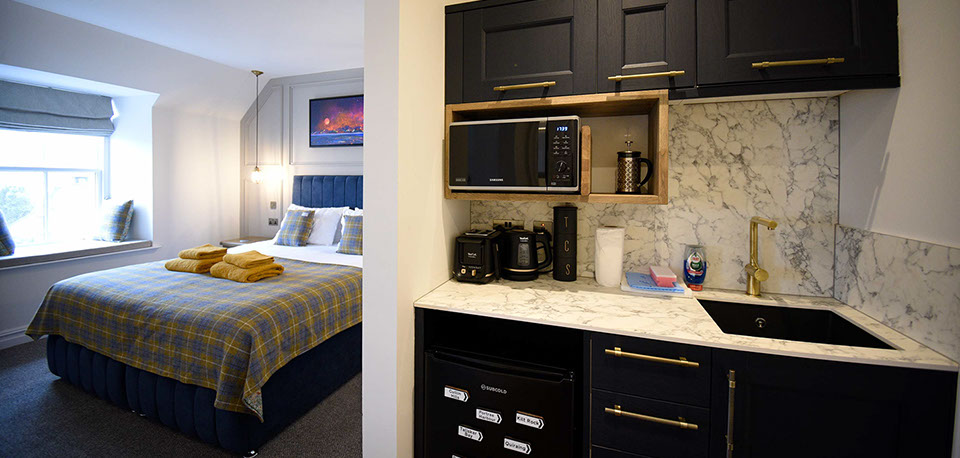 Somerled House Suites are modern self catering apartments with kitchenette contaning microwave kettle fridge and toaster