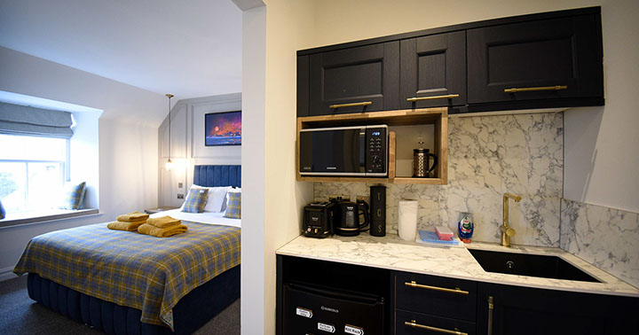 Somerled House Suites are modern self catering apartments with kitchenette contaning microwave kettle fridge and toaster