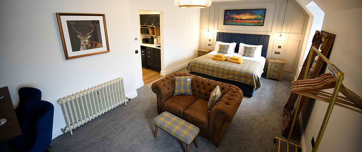 Somerled House Suites Room 4 contains a King size bed with WIFI internet at our Portree self catering accommodation