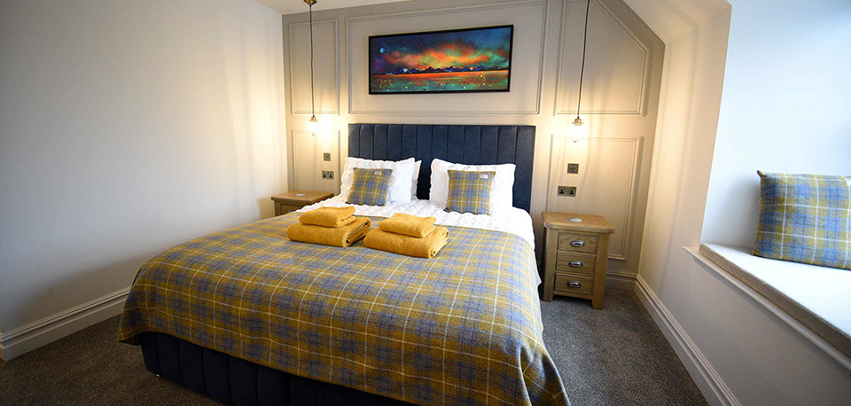 Somerled House Suites room 4 contains a King Size bed with all bedding and linen provided