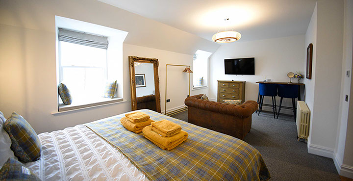 Somerled House Suites self catering accommodation contains King size beds with widescreen TV at our Portree accommodation